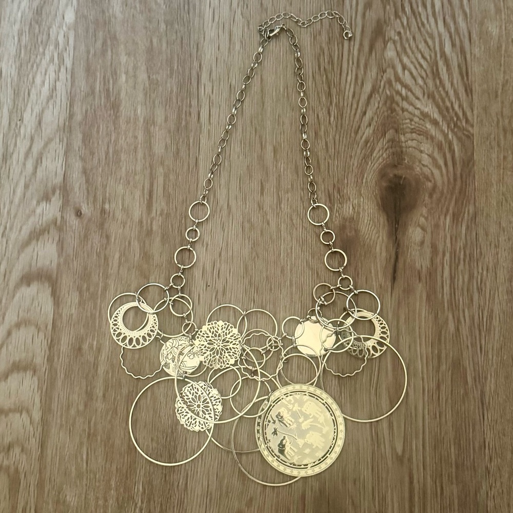 Artistic Gold Tone Hoop & Medallion Fringe Statement Bib Necklace With Elephants